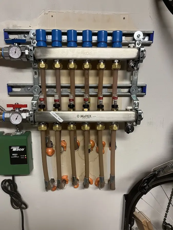 Plumber performing Gas Line Installation at a residential property in Wilton